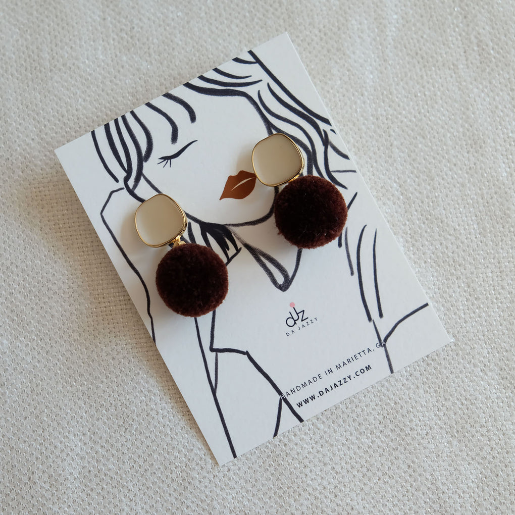 BROWN POMPOM WHITE STUD EARRINGS